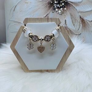 The Heart of Charms: Flower & Heart Charms Bracelet